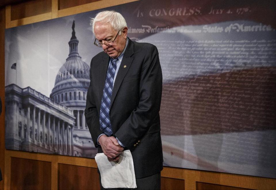 Senate Veterans Affairs Committee Chairman Sen. Bernie Sanders, I-Vt., stands in defeat after a divided Senate derailed Democratic legislation providing $21 billion for medical, education and job-training benefits for the nation's veterans, as the bill fell victim to election-year disputes over spending and whether to slap sanctions on Iran, Thursday, Feb. 27, 2014, on Capitol Hill in Washington. (AP Photo/J. Scott Applewhite)