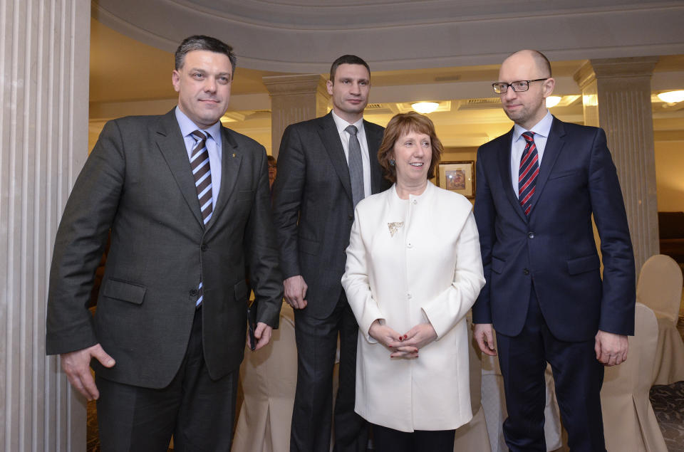 EU Foreign Policy chief Catherine Ashton, second right, poses prior to her meeting with Ukrainian opposition leaders, Oleh Tyahnybok, left, Arseniy Yatsenyuk, right, and Vitali Klitschko, second left, in Kiev, Ukraine, Tuesday, Jan. 4, 2014. (AP Photo/Andrew Kravchenko, Pool)