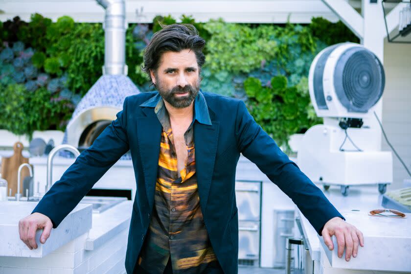 Los Angeles County, CA - October 06: Portrait of actor John Stamos on Thursday, Oct. 6, 2022 at his home in Los Angeles County, CA. (Francine Orr / Los Angeles Times)