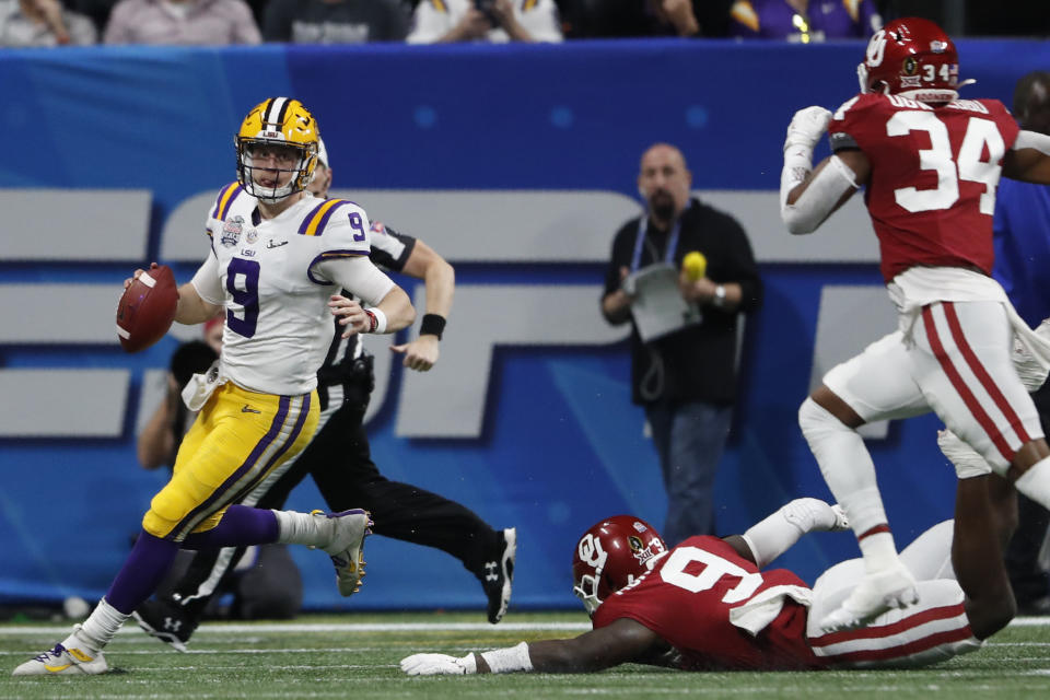 LSU quarterback Joe Burrow (9) runs out of the pocket against Oklahoma during the first half of the Peach Bowl NCAA semifinal college football playoff game, Saturday, Dec. 28, 2019, in Atlanta. (AP Photo/John Bazemore)