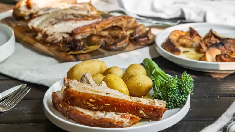 Belly of pork with potatoes and broccoli