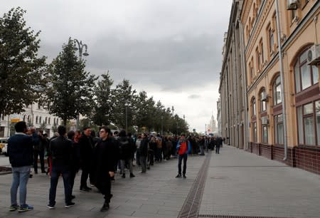 Participants attend a rally in support of Pavel Ustinov, in Moscow