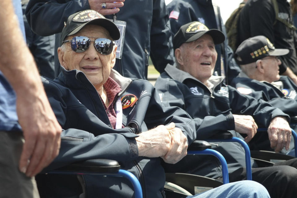 American D-Day veterans sit during a welcoming ceremony at Deauville airport, Monday, June 3, 2024 in Deauville, Normandy to attend D-Day 80th anniversary commemorations. (AP Photo/Alexander Turnbull)