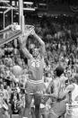 FILE - In this April 4, 1983, file photo, North Carolina State's Lorenzo Charles (43) dunks the ball in the basket to give N.C. State a 54-52 win over Houston in the NCAA Final Four Championship game in Albuquerque, N.M. (AP Photo/File)