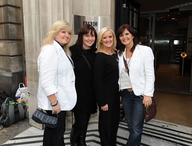 linda coleen bernie and maureen nolan posing together