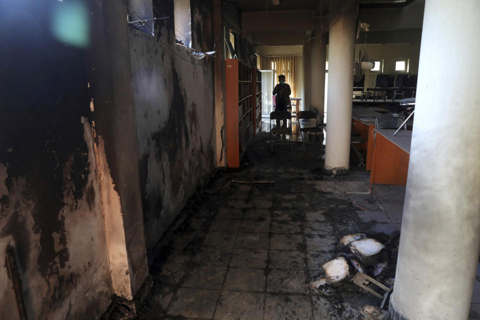 A burned library at the Kabul University is seen after a deadly attack in Kabul, Afghanistan, Tuesday, Nov. 3, 2020. The brazen attack by gunmen who stormed the university has left many dead and wounded in the Afghan capital. The assault sparked an hours-long gun battle. (AP Photo/Rahmat Gul)
