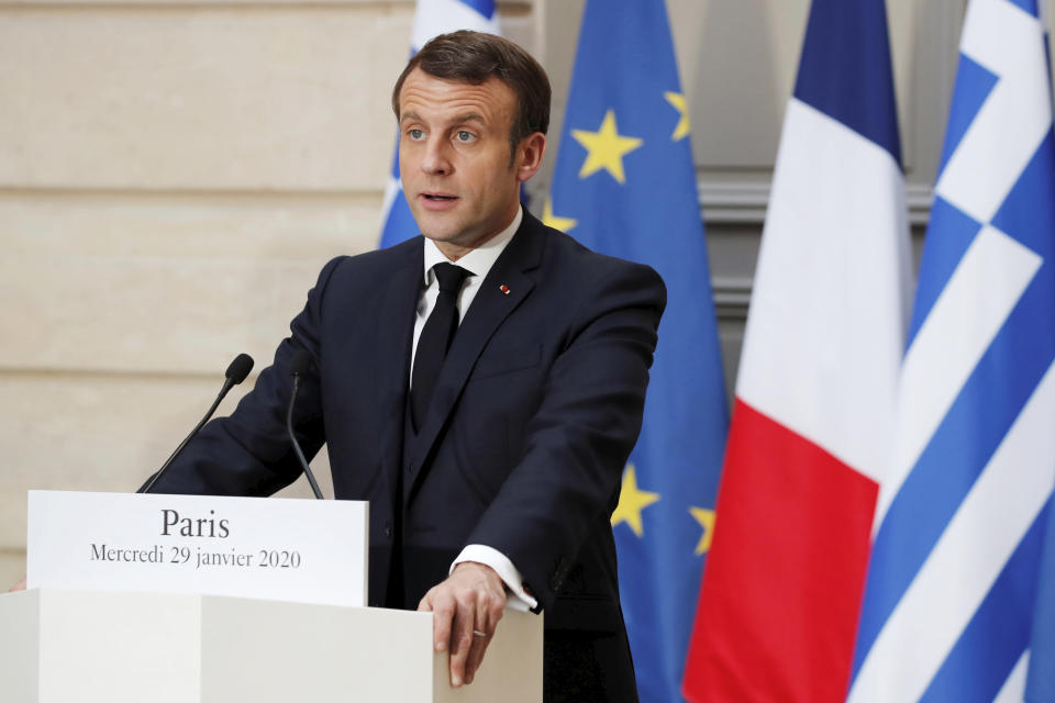 French President Emmanuel Macron speaks speaks during a joint press conference with Greek Prime Minister Kyriakos Mitsotakis at the Elysee Palace in Paris, Wednesday Jan. 29, 2020. (Benoit Tessier/Pool via AP)