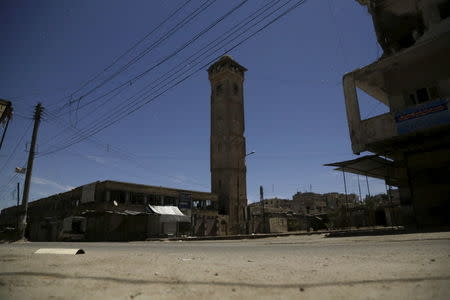 A damaged minaret is pictured at night in the rebel-controlled area of Maaret al-Numan town in Idlib province, Syria December 26, 2015. REUTERS/Khalil Ashawi