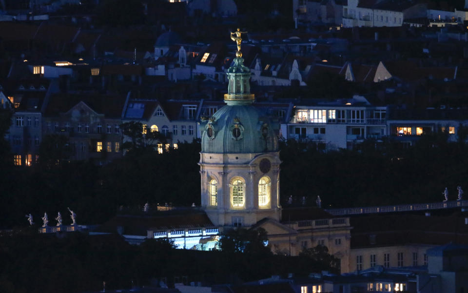 The illuminated dome of Charlottenburg Palace is pictured in Berlin, October 2, 2013. REUTERS/Fabrizio Bensch (GERMANY  - Tags: CITYSCAPE)