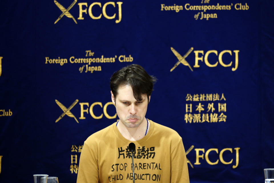 Tokyo-based Australian journalist Scott McIntyre speaks during a press conference at the Foreign Correspondent's Club Japan in Tokyo Thursday, Jan. 16, 2020. McIntyre said he is a victim of “inhumane" custody laws that allow only one side of the parents access to children of broken marriages, the day after he was convicted of trespassing at the apartment building of his estranged wife's in-laws for trying to find his children. (AP Photo/Eugene Hoshiko)