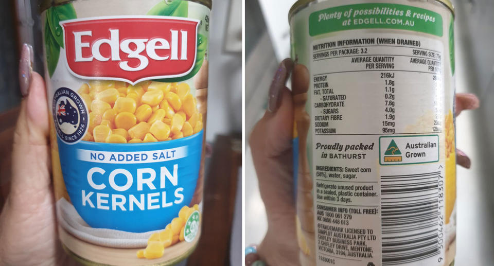 Can of Edgell corn shown as shopper complains the Australian product has less shelf space than imported corn.