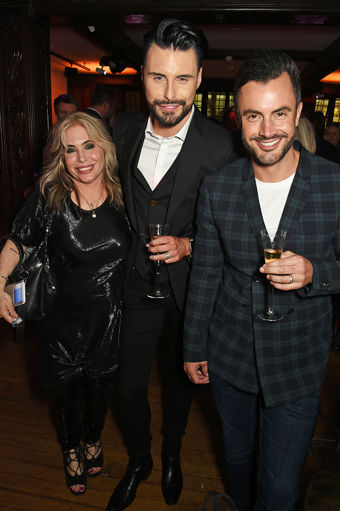 Rylan Clark pictured with his now ex husband Dan Neal and Brix Smith-Start in 2016. (Getty Images)