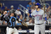 New York Mets' J.D. Martinez (28) reacts after striking out swinging during the fourth inning of a baseball game against the Miami Marlins, Friday, May 17, 2024, in Miami. (AP Photo/Wilfredo Lee)