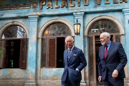 Britain's Prince Charles visits the set of James Bond at Pinewood Studios