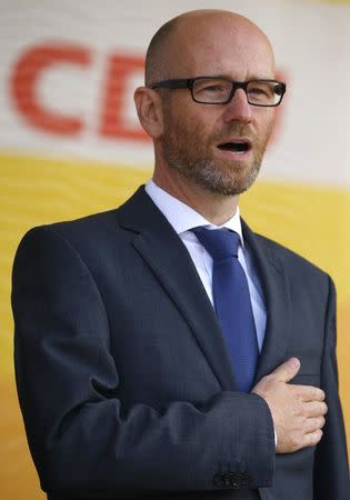 Secretary General of the Democratic Union Party (CDU) Peter Tauber, attends an election rally ahead of the upcoming federal election in Sankt Peter-Ording, Germany, August 21, 2017. REUTERS/Morris Mac Matzen