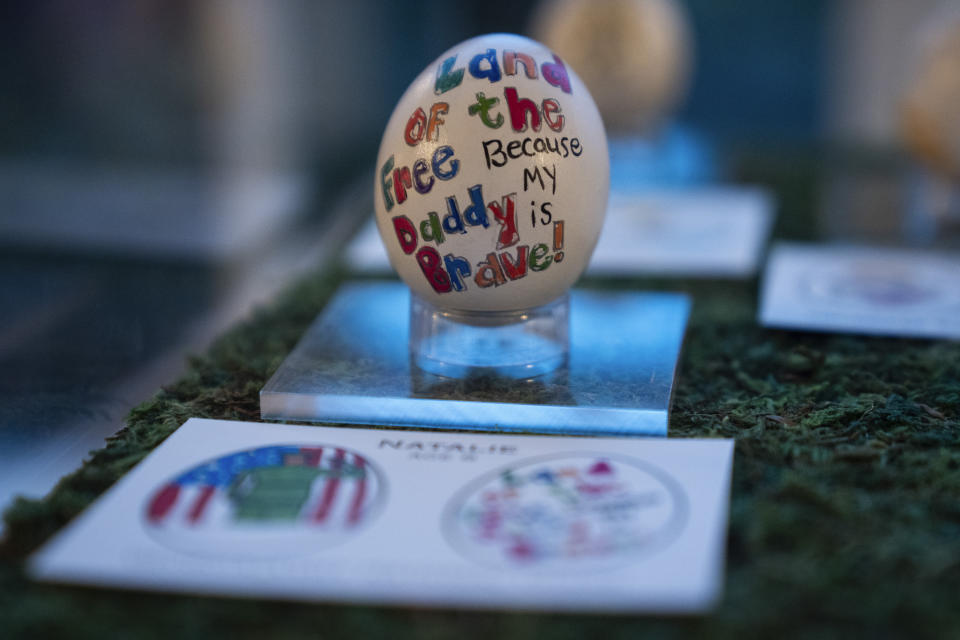 Eggs designed by children of members of the military adorn the East Colonnade of the White House ahead of the White House Easter Egg Roll, Thursday, March 28, 2024, in Washington. (AP Photo/Evan Vucci)