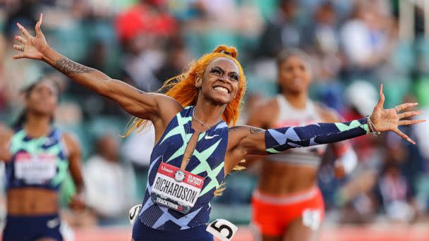 PHOTO: Sha'Carri Richardson celebrates winning the Women's 100 Meter final on day 2 of the 2020 U.S. Olympic Track & Field Team Trials at Hayward Field on June 19, 2021, in Eugene, Ore. (Patrick Smith/Getty Images)