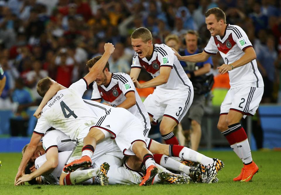 Germany players celebrate after winning the 2014 World Cup final between Germany and Argentina at the Maracana stadium