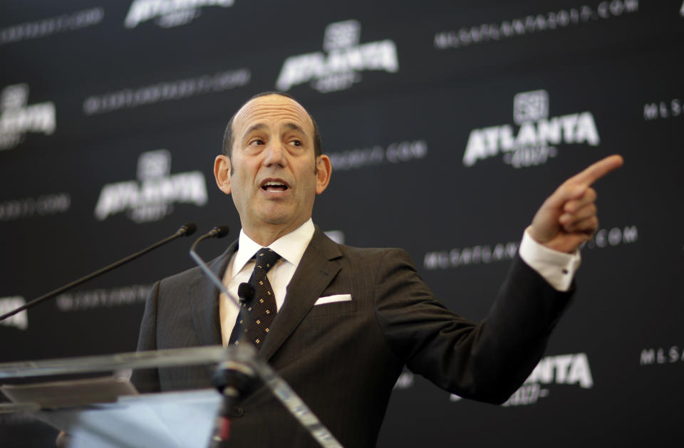 Major League Soccer Commissioner Don Garber speaks during a news conference announcing the city will be getting an MLS expansion team, Wednesday, April 16, 2014, in Atlanta. MLS announced its newest franchise Wednesday, unveiling a team for Atlanta that will begin play in 2017 at the city's new retractable roof stadium. (AP Photo/David Goldman)