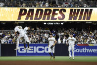 San Diego Padres celebrate after the Padres beat the Los Angeles Dodgers 5-3 in a baseball game Wednesday, June 23, 2021, in San Diego. (AP Photo/Denis Poroy)