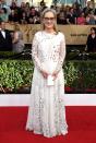 <p>The angelic actress floated down the red carpet n a white gown with birds on it. (Photo: Getty Images) </p>