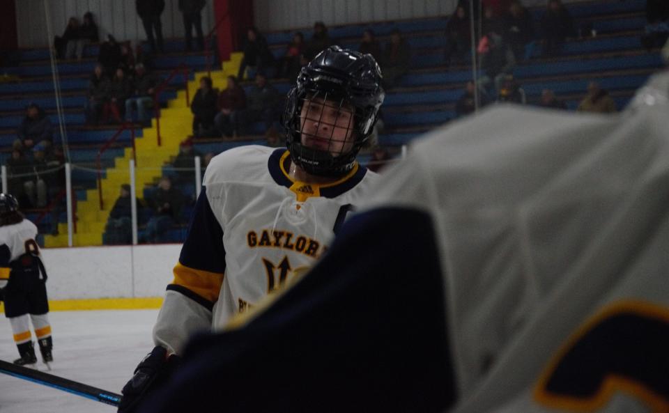 Gage Looker skates towards the bench during a high school hockey matchup between Gaylord and Petoskey on Wednesday, January 18 at the Otsego Country Sportsplex in Gaylord, Mich.