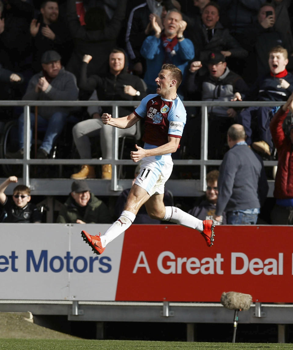 Burnley's Chris Wood celebrates scoring his side's first goal of the game against Tottenham Hotspur during their English Premier League soccer match at Turf Moor in Burnley, England, Saturday Feb. 23, 2019. (Martin Rickett/PA via AP)