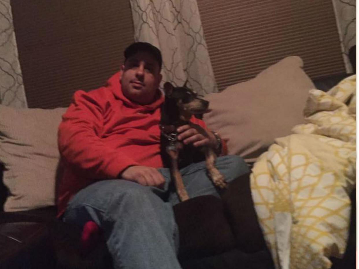 The dog with one of his owners, Lonnie Levy: Facebook