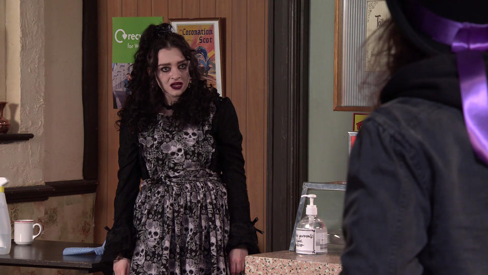 FROM ITV

STRICT EMBARGO - No Use Before  Tuesday 20th April 2021

Coronation Street - Ep 10309

Monday 26th April 2021 - 1st Ep

In a bid to win Nina Lucas [MOLLIE GALLAGHER] round, Seb Franklin [HARRY VISINONI] calls at the cafe in full Goth attire and handing her a funeral wreath for her birthday, explains how George helped him achieve the look. NinaÕs furious and accuses him of making a mockery of her yet again. 

Picture contact David.crook@itv.com 

This photograph is (C) ITV Plc and can only be reproduced for editorial purposes directly in connection with the programme or event mentioned above, or ITV plc. Once made available by ITV plc Picture Desk, this photograph can be reproduced once only up until the transmission [TX] date and no reproduction fee will be charged. Any subsequent usage may incur a fee. This photograph must not be manipulated [excluding basic cropping] in a manner which alters the visual appearance of the person photographed deemed detrimental or inappropriate by ITV plc Picture Desk. This photograph must not be syndicated to any other company, publication or website, or permanently archived, without the express written permission of ITV Picture Desk. Full Terms and conditions are available on  www.itv.com/presscentre/itvpictures/terms