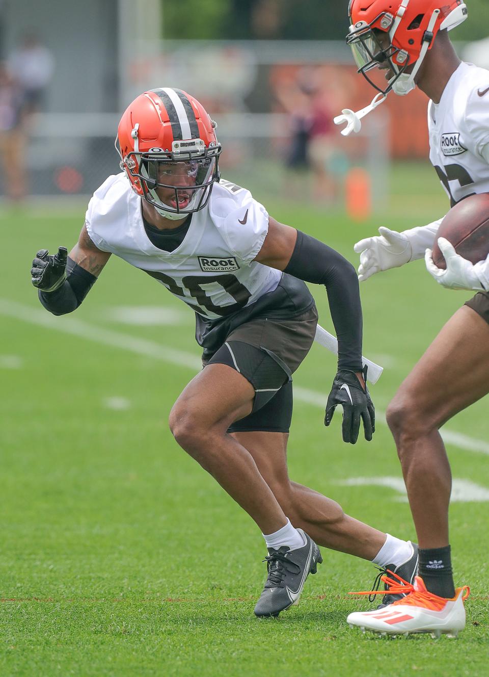 Cleveland Browns cornerback Greg Newsome III works on a pass coverage drill during training camp on Thursday, July 28, 2022 in Berea.