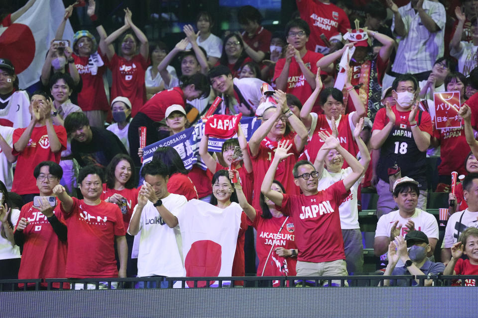 Japan's supporters cheer the team during the first half of their Basketball World Cup classification match against Cape Verde in Okinawa, southern Japan, Saturday, Sept. 2, 2023. (AP Photo/Hiro Komae)