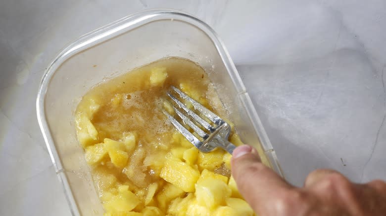 macerating cubed pineapple