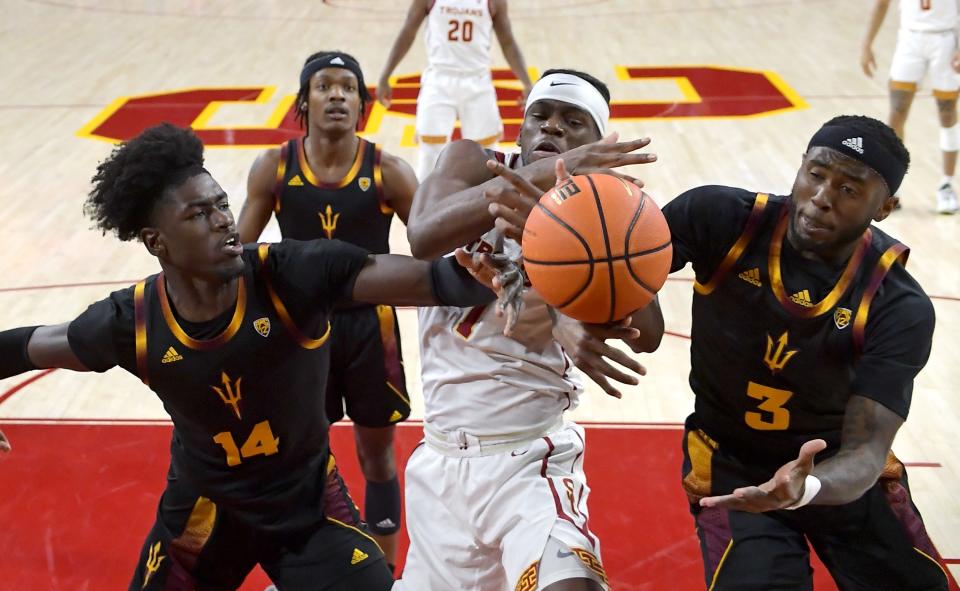 Jan 24, 2022; Los Angeles, California, USA;  Arizona State Sun Devils center Enoch Boakye (14), USC Trojans forward Chevez Goodwin (1) and Arizona State Sun Devils guard Marreon Jackson (3) battle for a rebound in the first half the game at Galen Center. Mandatory Credit: Jayne Kamin-Oncea-USA TODAY Sports