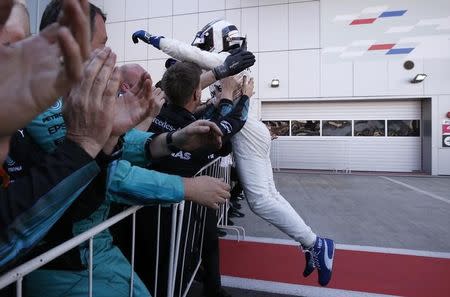 Formula One - F1 - Russian Grand Prix - Sochi, Russia - 30/04/17 - Mercedes Formula One driver Valtteri Bottas of Finland celebrates the victory with team members after the race. REUTERS/Maxim Shemetov