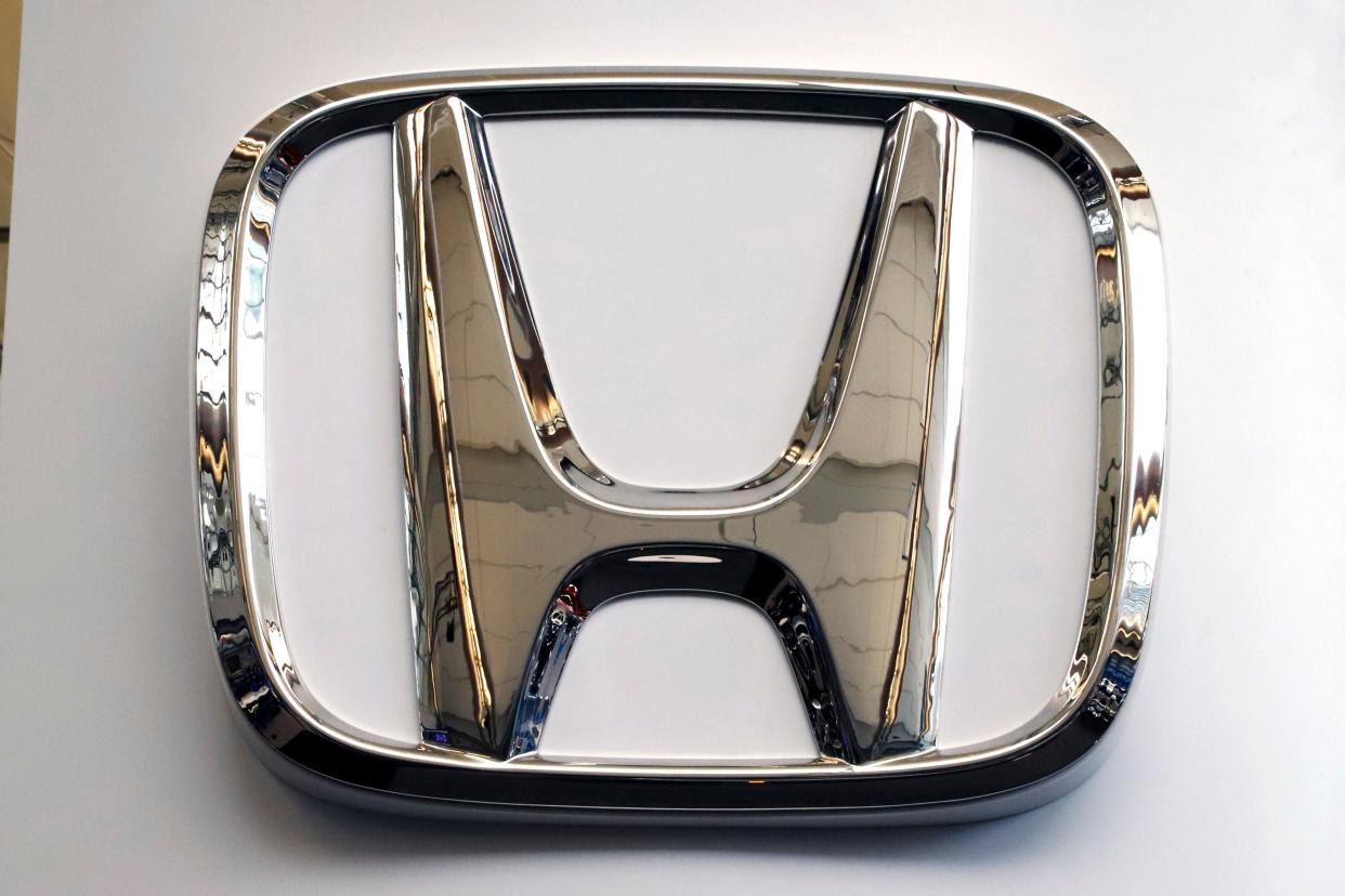 This Feb. 14, 2019 file photo shows a Honda logo at the 2019 Pittsburgh International Auto Show in Pittsburgh. Honda is recalling more than 380 Civic, Accord, Acura RDX and Integra vehicles for a potential brake issue.