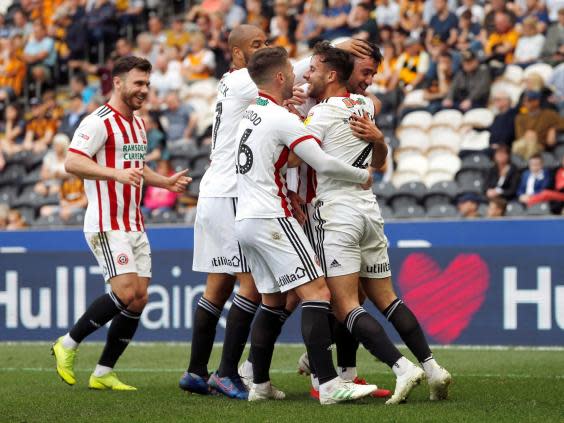 Hull vs Sheffield United: David McGoldrick double helps Blades near end to Premier League exile