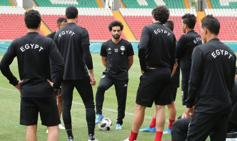 Egypt's Mohamed Salah (C) missed his team's defeat to Uruguay as he struggles to recover from the shoulder injury sustained during last month's Champions League Final