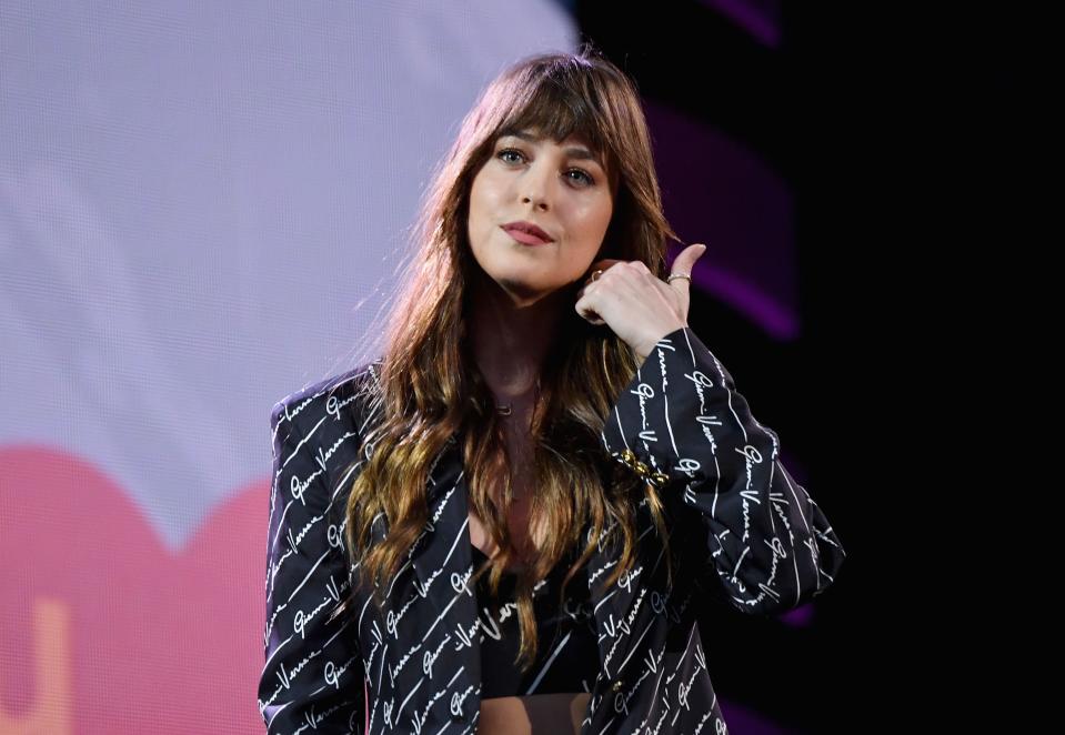 US actress Dakota Johnson speaks onstage at the 2019 Global Citizen Festival: Power The Movement in Central Park in New York on September 28, 2019. (Photo by Angela Weiss / AFP)        (Photo credit should read ANGELA WEISS/AFP/Getty Images)