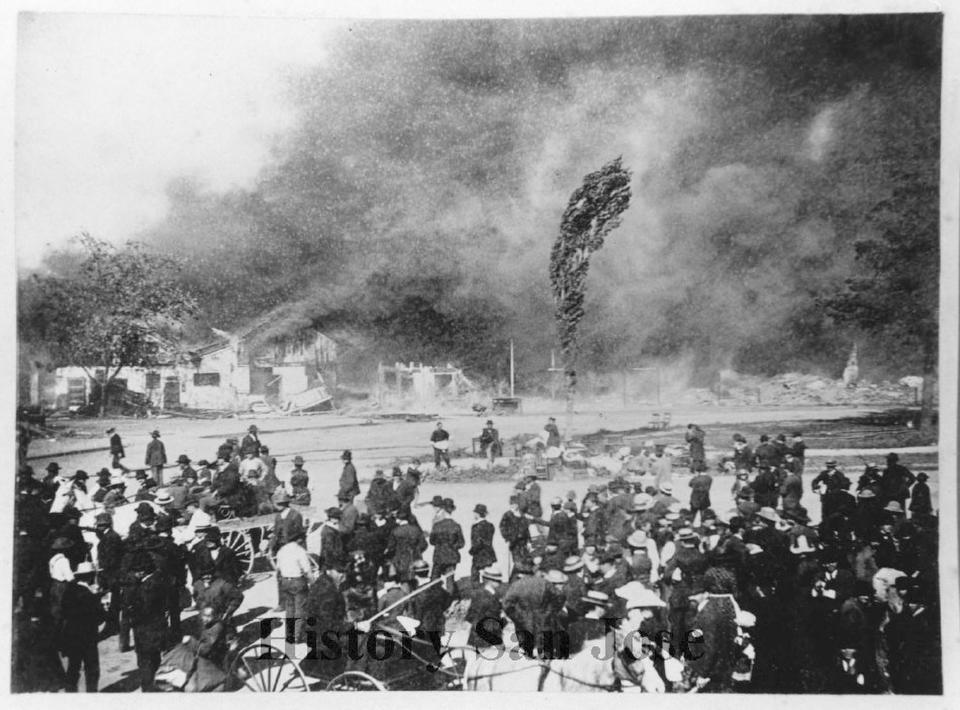 This May 4, 1887, photo provided by History San Jose, part of the History San Jose Photographic Collection, shows a fire at Market Street in Chinatown in San Jose, Calif. The city of San Jose was once home to one of the largest Chinatowns in California. More than a century after arsonists burned it to the ground in 1887, the San Jose City Council on Tuesday, Sept. 28, 2021, unanimously approved a resolution to apologize to Chinese immigrants and their descendants for the role the city played in “systemic and institutional racism, xenophobia, and discrimination.” (San Jose Research Library & Archives/History San Jose via AP)