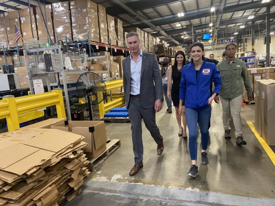 First Lady Casey DeSantis gets a tour of Tervis from company president and CEO Rogan Donelly.