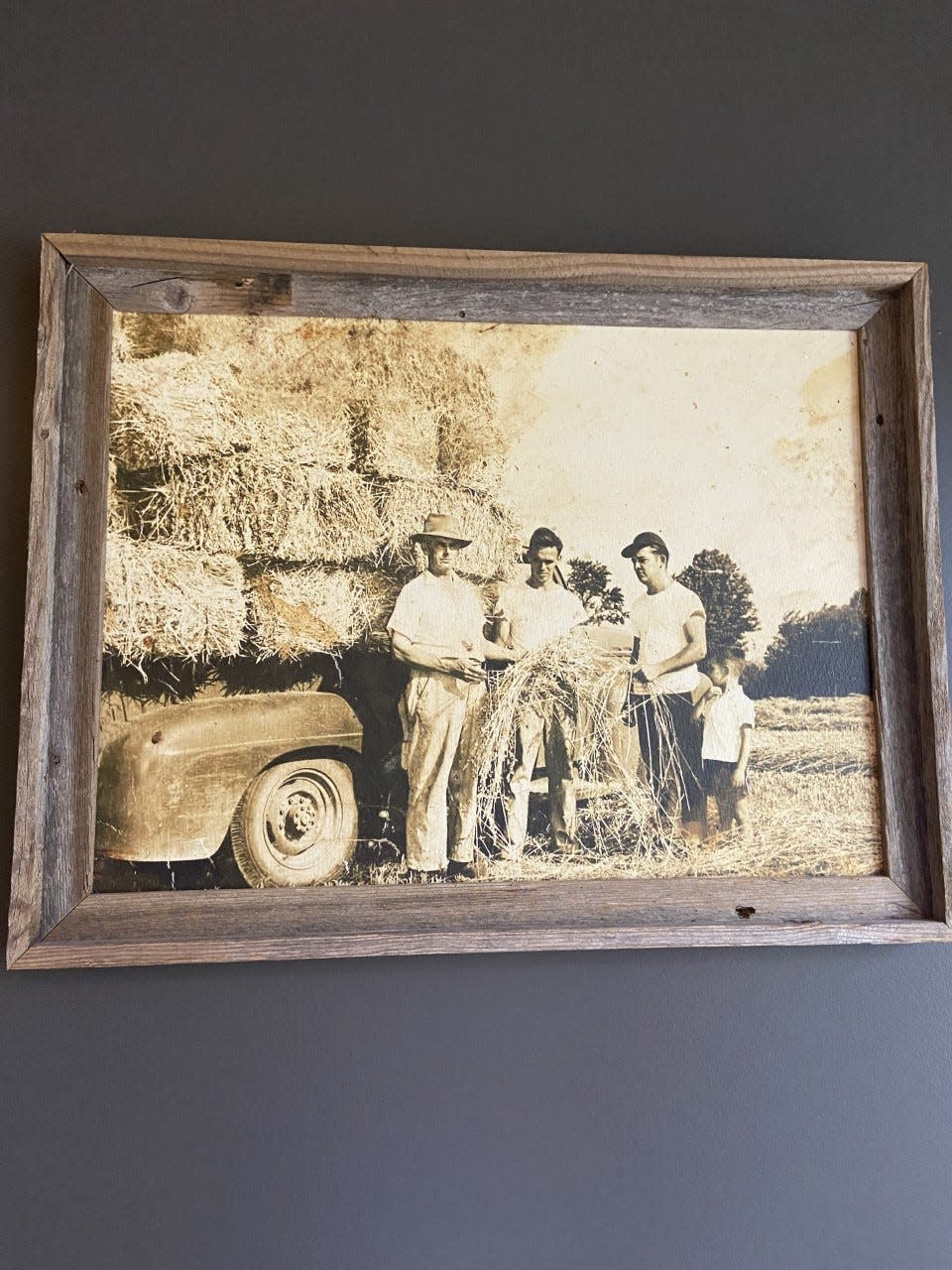 Vintage family photographs hang in some of the venues at Red Gate Farms.