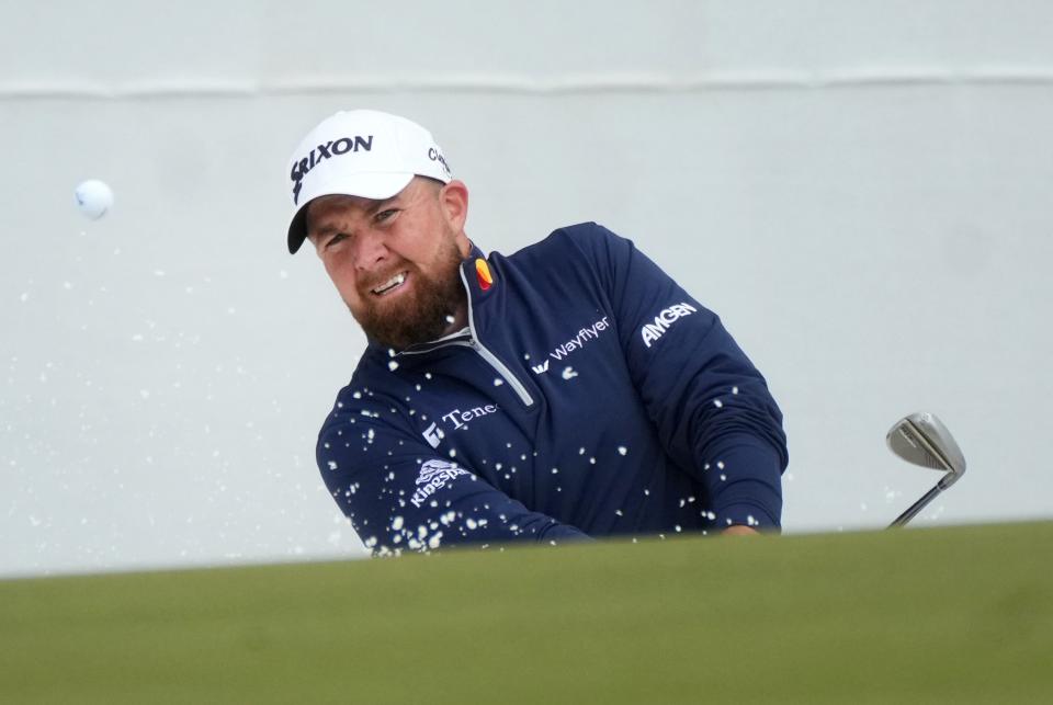 Shane Lowry hits out of a bunker on the 16th hole during the 2024 Phoenix Open at TPC Scottsdale on Feb. 8, 2024.