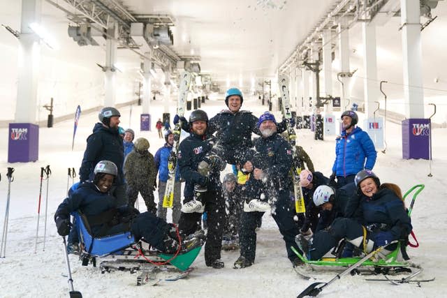 Team UK members in snow gear at the launch of the Invictus Games 2025 