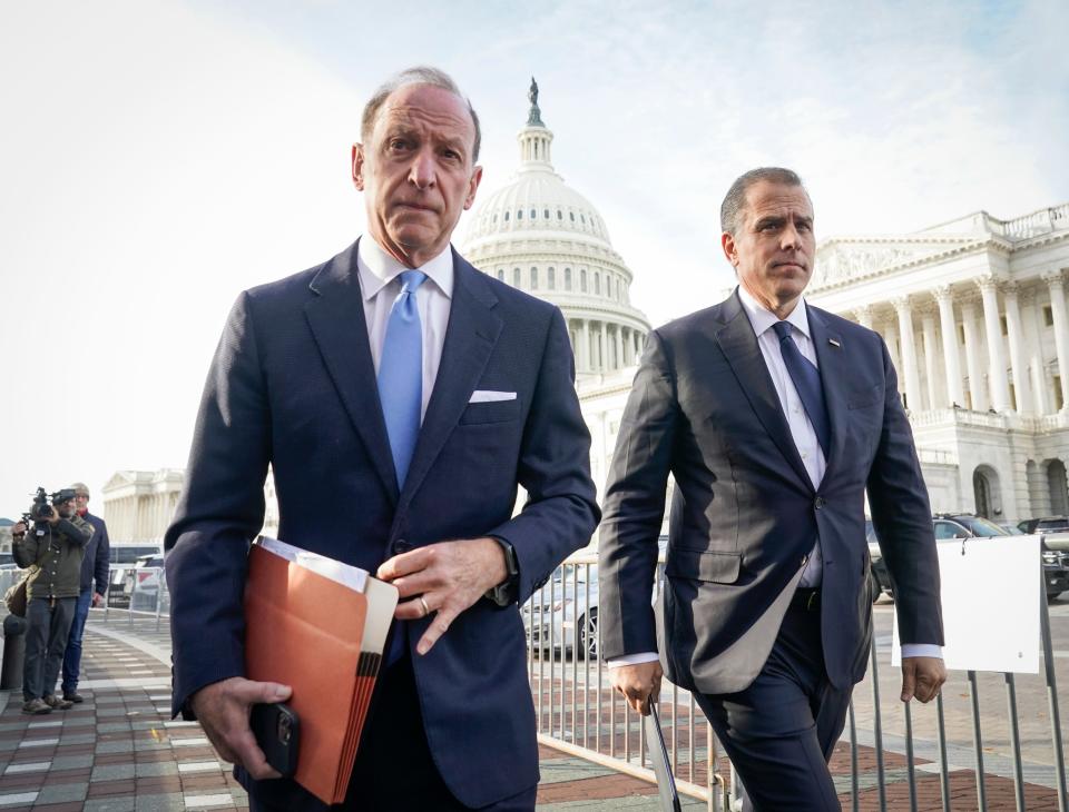 Hunter Biden, the son of President Joe Biden, arrives with his attorney Abbe Lowell, left, for a press conference outside the United States Capitol steps to offer to publicly testify in House Republican's request on Dec. 13, 2023 in Washington, D.C.