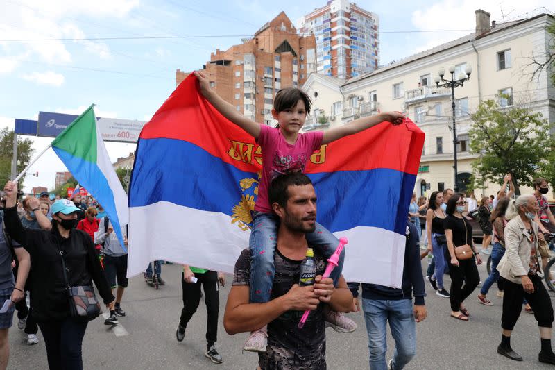 People take part in a rally in support of former regional governor Sergei Furgal in Khabarovsk