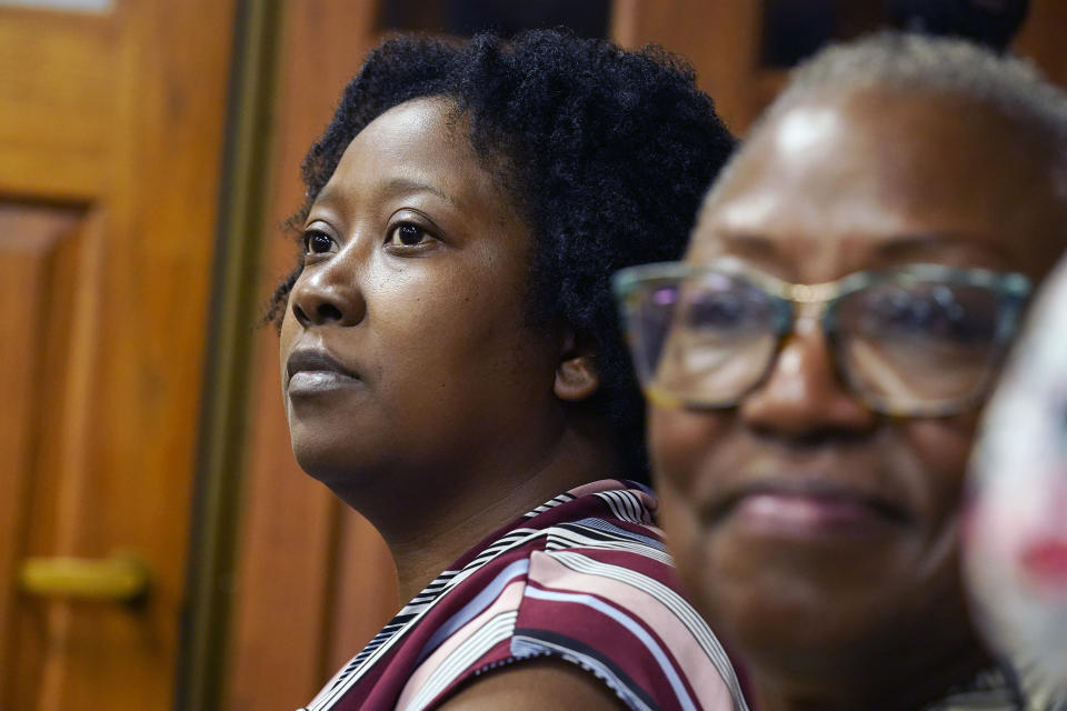 FILE - Tanya Marsaw, a parent of four with one child in a public middle school and a member of Parents For Public Schools, listens as attorneys for the nonprofit group present arguments in Hinds County Chancery Court in Jackson, Miss., Aug. 23, 2022, in a lawsuit claiming the state is violating its own constitution with a federally funded grant program for private schools. A Mississippi judge on Thursday, Oct. 13, 2022, blocked a state law that put $10 million of federal pandemic relief money into infrastructure grants for private schools. (AP Photo/Rogelio V. Solis, File)