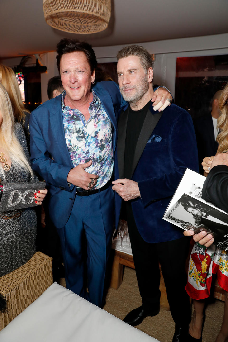 CANNES, FRANCE - MAY 13: Michael Madsen (L) and John Travolta attend the HFPA Event with Particpant Media to Honor the Kailash Satyarthi Children's Foundation in partnership with Renault at Nikki Beach on May 13, 2018 in Cannes, France.  (Photo by David M. Benett/Dave Benett/Getty Images for Nikki Beach)