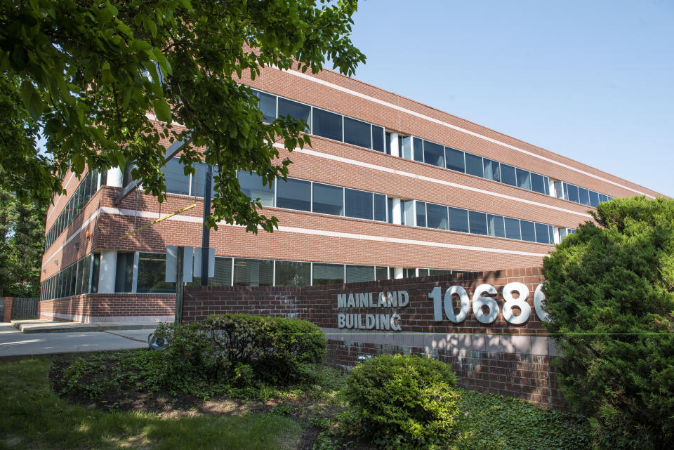 A sign is displayed for the building that houses the office of Rep. Gerry Connelly, D-Va., in Fairfax, Va., Monday, May 15, 2023. A man with a baseball bat walked into Connolly's Fairfax office, asked for him, and then struck two members of his staff with the bat, police said. Fairfax City Police in northern Virginia said in a tweet that a suspect is in custody and the victims are being treated for injuries that are not life-threatening. (AP Photo/Cliff Owen)