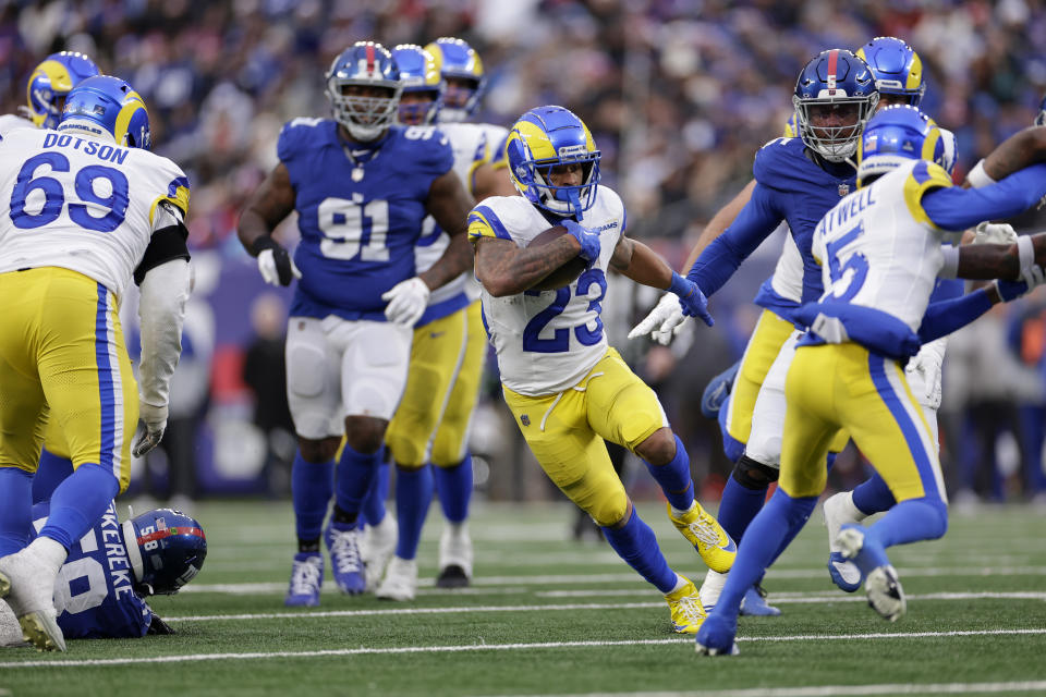 Los Angeles Rams running back Kyren Williams (23) runs in a touchdown during the second half an NFL football game against the New York Giants, Sunday, Dec. 31, 2023, in East Rutherford, N.J. (AP Photo/Adam Hunger)