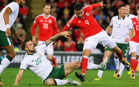 Shane Duffy of Ireland challenges Hal Robson-Kanu of Wales in action  - Credit: Getty images